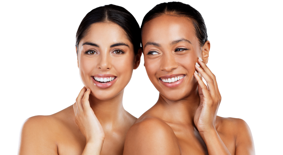 two women smiling after mirconeedling treatment