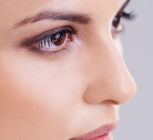 Side view of woman with great eyes after having under-eye filler