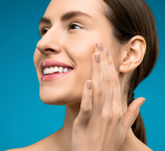 Smiling Woman touching her cheek