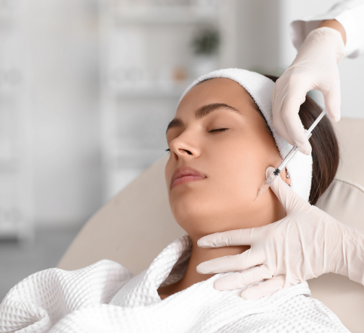 Close up of dermal filler injection on woman's jawline