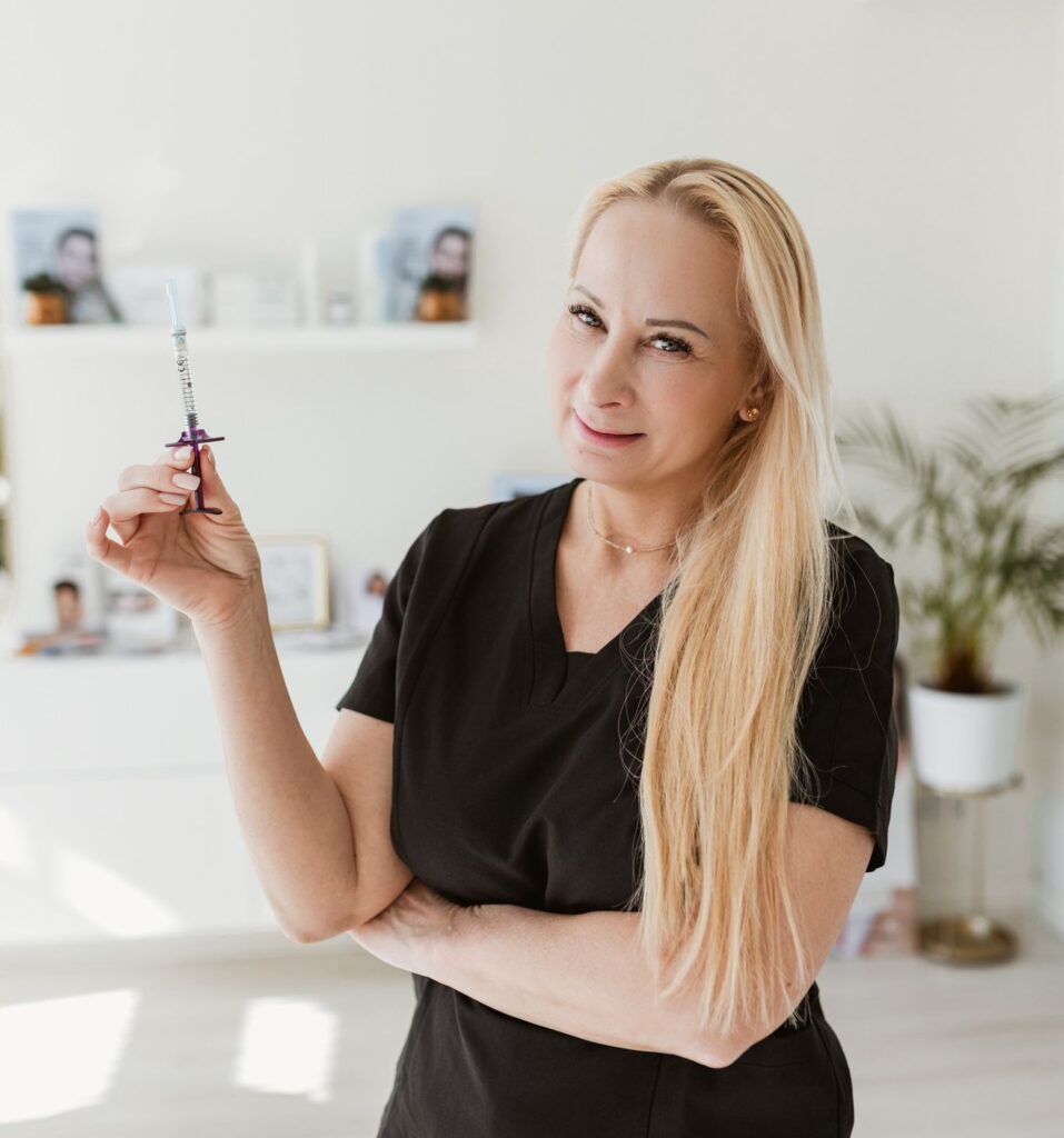 Jogita holding an injectable