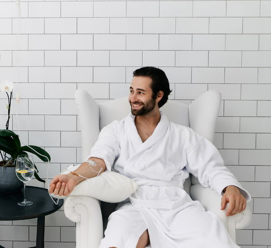 Man relaxing during a professional IV drip session