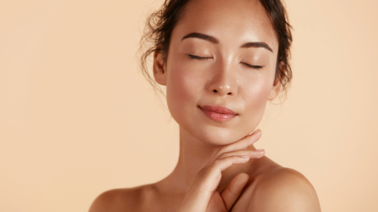 Woman showing radiant, healthy-looking skin